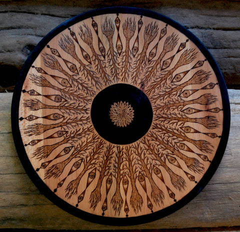 Mandala Pattern with Trees and Eyes Woodburning on Recycled Wood.